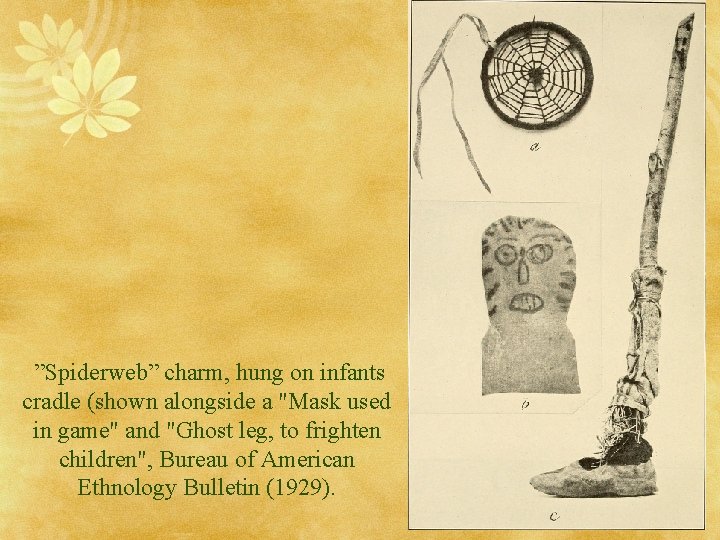”Spiderweb” charm, hung on infants cradle (shown alongside a "Mask used in game" ”Spiderweb” charm, hung on infants cradle (shown alongside a "Mask used in game"