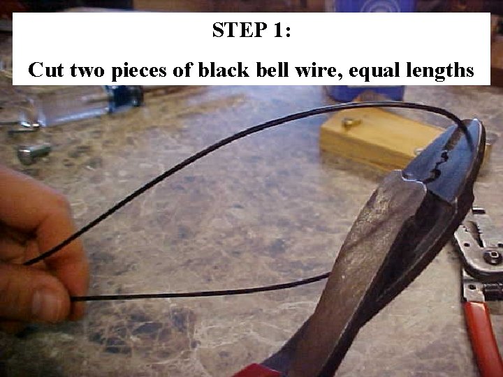 STEP 1: Cut two pieces of black bell wire, equal lengths 