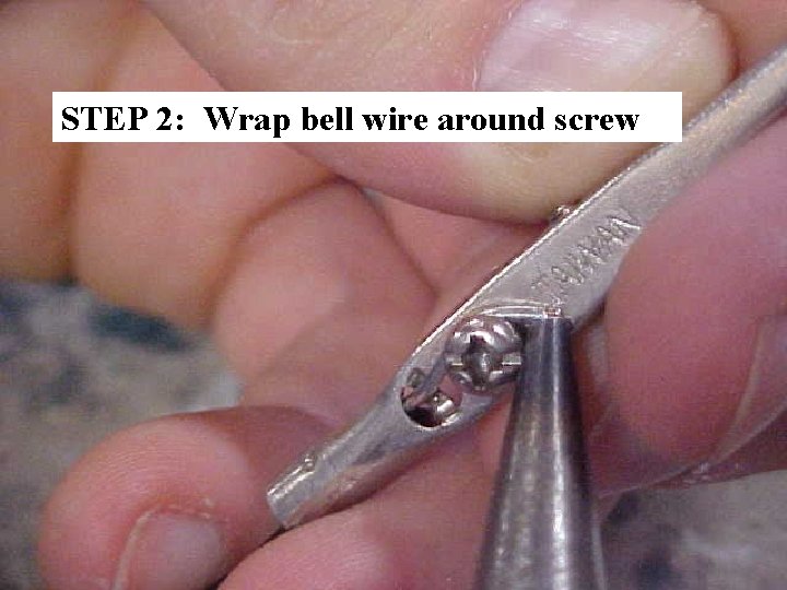 STEP 2: Wrap bell wire around screw 