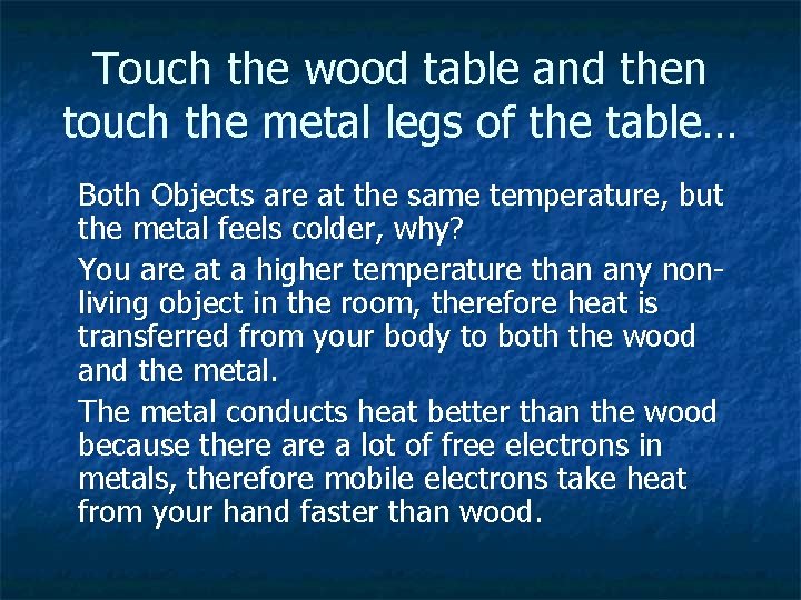 Touch the wood table and then touch the metal legs of the table… Both