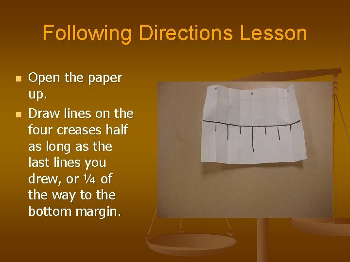 Following Directions Lesson n n Open the paper up. Draw lines on the four Following Directions Lesson n n Open the paper up. Draw lines on the four