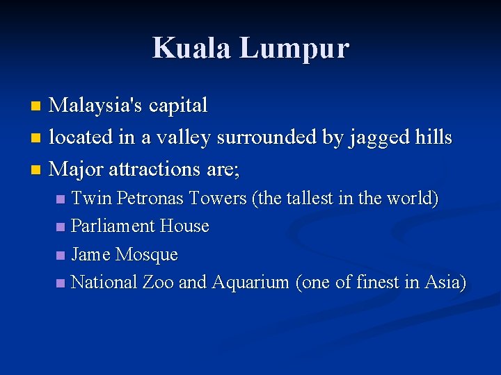 Kuala Lumpur Malaysia's capital n located in a valley surrounded by jagged hills n