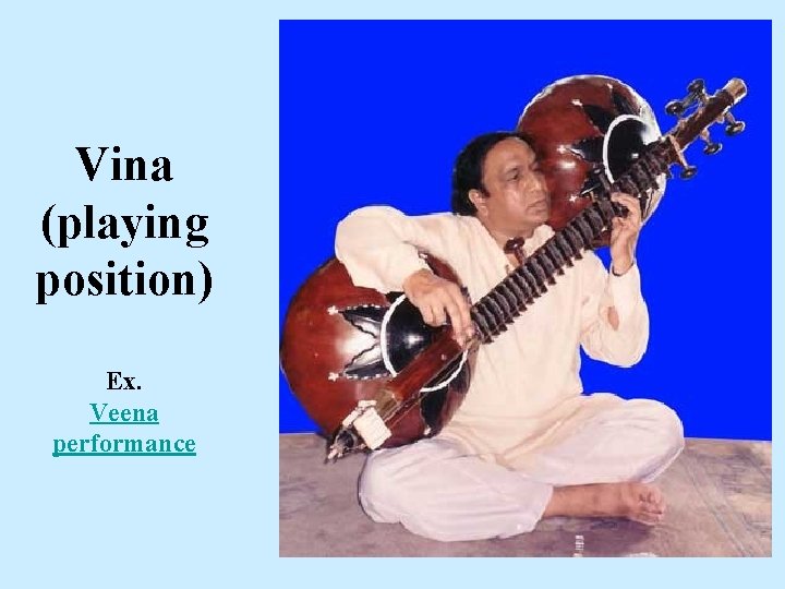 Vina (playing position) Ex. Veena performance 