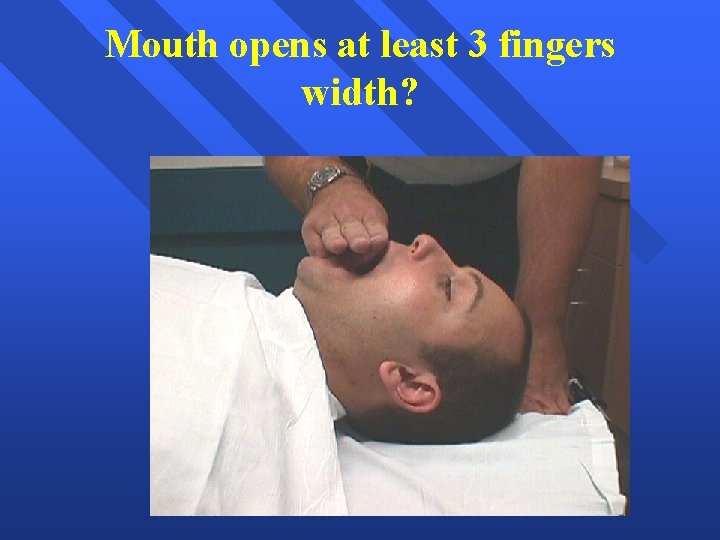 Mouth opens at least 3 fingers width? 