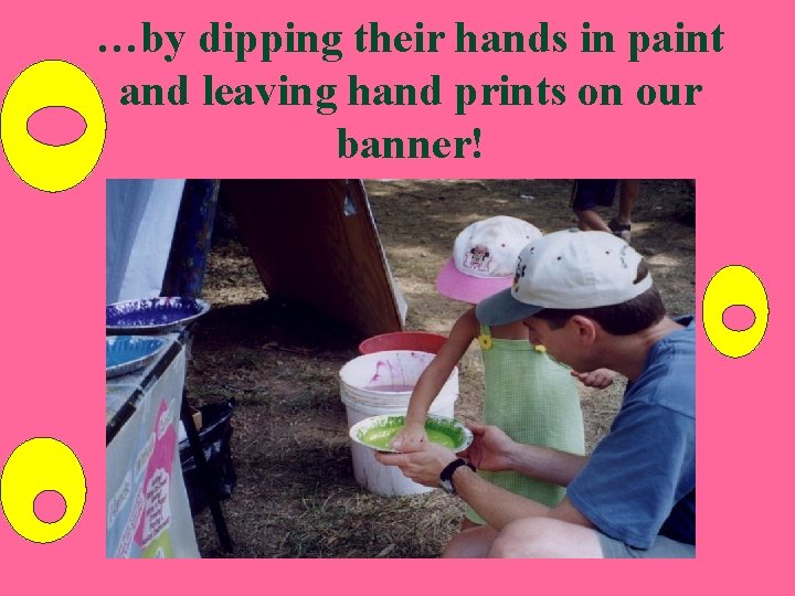 …by dipping their hands in paint and leaving hand prints on our banner! 