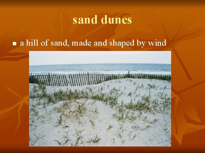 sand dunes n a hill of sand, made and shaped by wind 