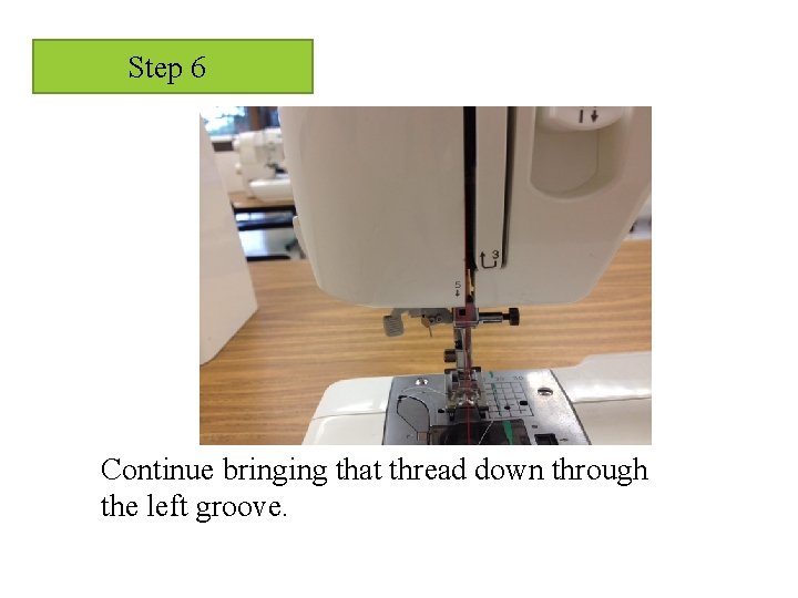 Step 6 Continue bringing that thread down through the left groove. 