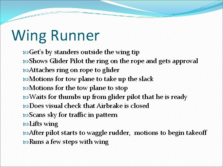 Wing Runner Get’s by standers outside the wing tip Shows Glider Pilot the ring