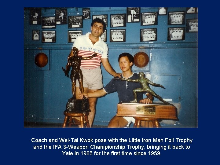 Coach and Wei-Tai Kwok pose with the Little Iron Man Foil Trophy and the