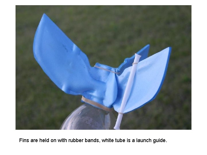 Fins are held on with rubber bands, white tube is a launch guide. 