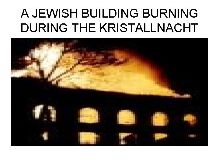 A JEWISH BUILDING BURNING DURING THE KRISTALLNACHT 