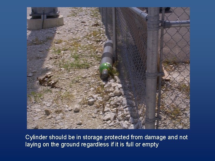 Cylinder should be in storage protected from damage and not laying on the ground