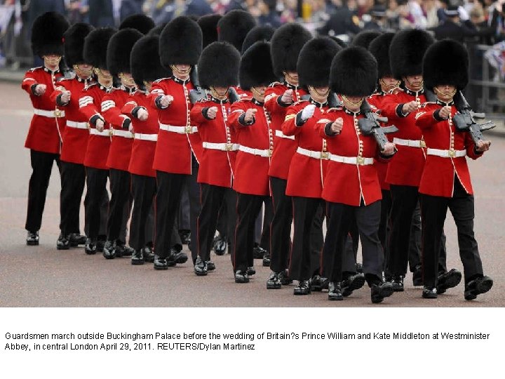 Guardsmen march outside Buckingham Palace before the wedding of Britain? s Prince William and