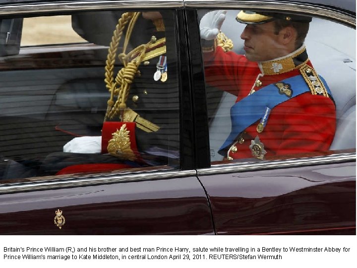 Britain's Prince William (R, ) and his brother and best man Prince Harry, salute