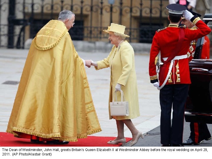 The Dean of Westminster, John Hall, greets Britain's Queen Elizabeth II at Westminster Abbey