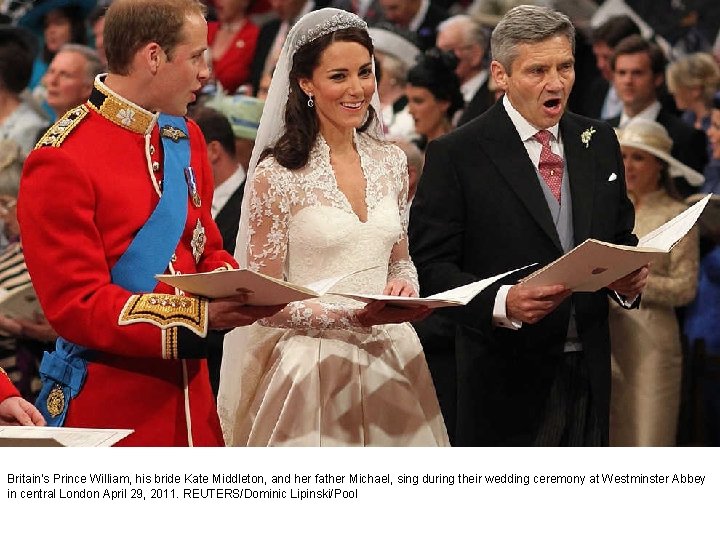 Britain's Prince William, his bride Kate Middleton, and her father Michael, sing during their