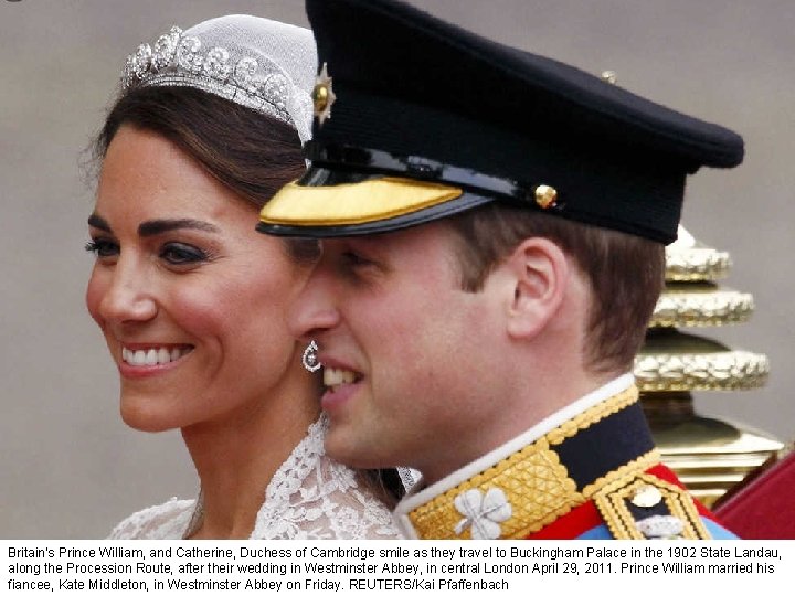 Britain's Prince William, and Catherine, Duchess of Cambridge smile as they travel to Buckingham