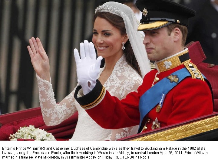 Britain's Prince William (R) and Catherine, Duchess of Cambridge wave as they travel to