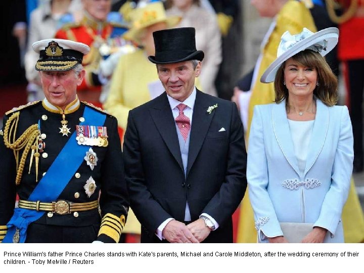 Prince William's father Prince Charles stands with Kate's parents, Michael and Carole Middleton, after