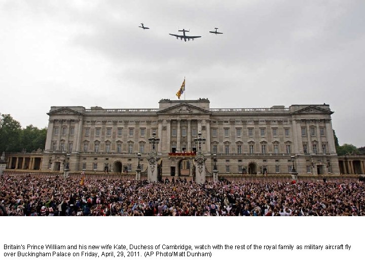 Britain's Prince William and his new wife Kate, Duchess of Cambridge, watch with the