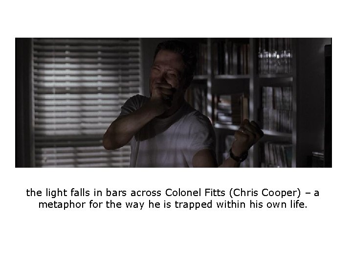 the light falls in bars across Colonel Fitts (Chris Cooper) – a metaphor for the light falls in bars across Colonel Fitts (Chris Cooper) – a metaphor for