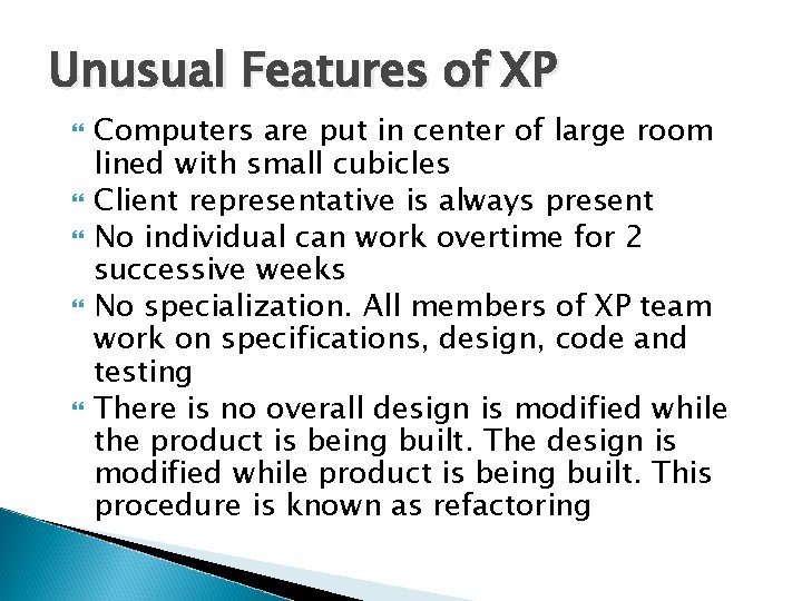 Unusual Features of XP Computers are put in center of large room lined with