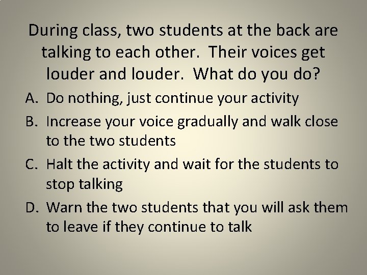 During class, two students at the back are talking to each other. Their voices