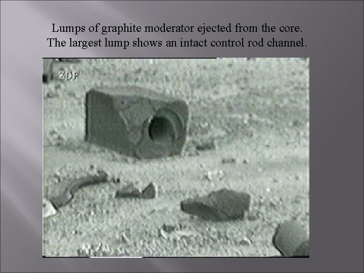 Lumps of graphite moderator ejected from the core. The largest lump shows an intact