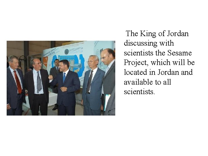 The King of Jordan discussing with scientists the Sesame Project, which will be located