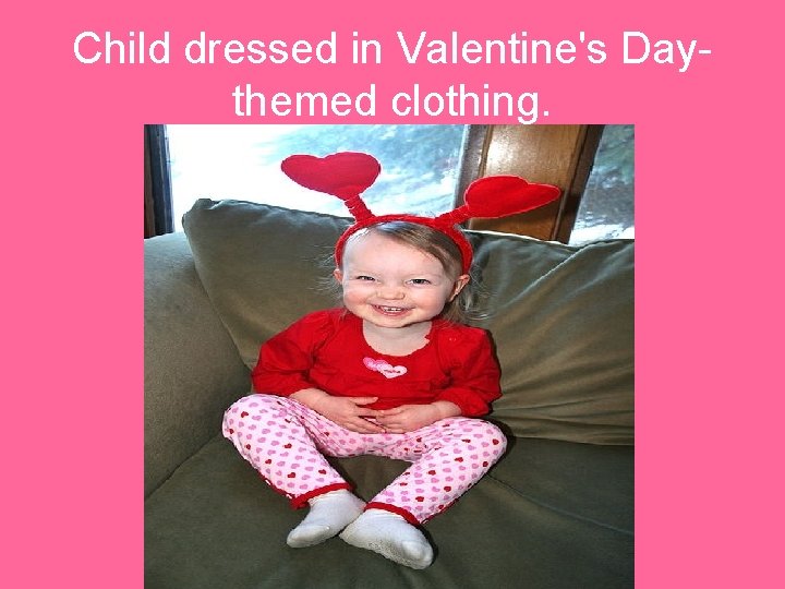 Child dressed in Valentine's Daythemed clothing. 