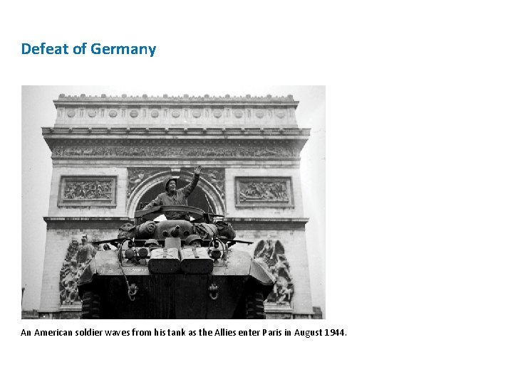 Defeat of Germany An American soldier waves from his tank as the Allies enter Defeat of Germany An American soldier waves from his tank as the Allies enter