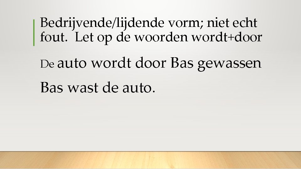 Bedrijvende/lijdende vorm; niet echt fout. Let op de woorden wordt+door De auto wordt door