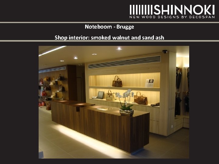 Noteboom - Brugge Shop interior: smoked walnut and sand ash Noteboom - Brugge Shop interior: smoked walnut and sand ash