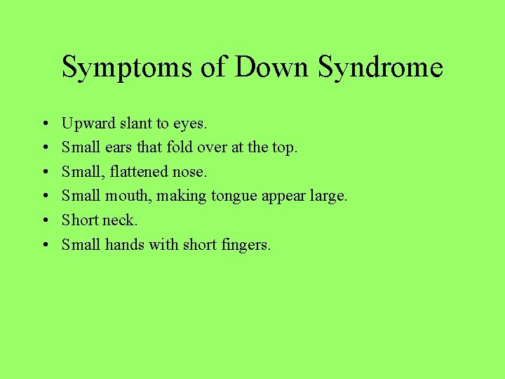 Symptoms of Down Syndrome • • • Upward slant to eyes. Small ears that