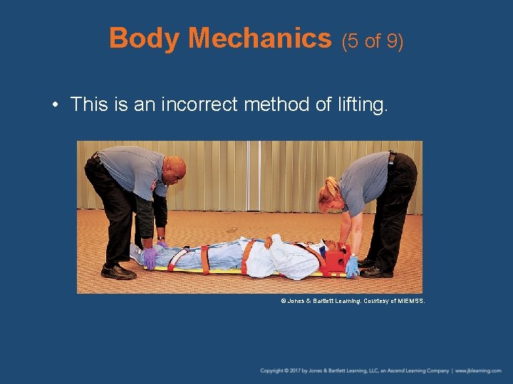 Body Mechanics (5 of 9) • This is an incorrect method of lifting. ©