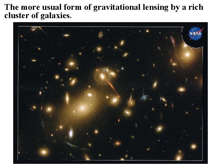 The more usual form of gravitational lensing by a rich cluster of galaxies. 