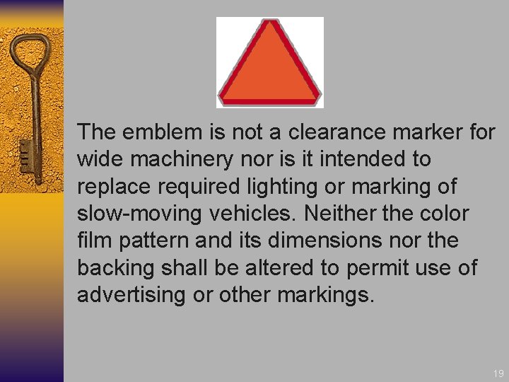 The emblem is not a clearance marker for wide machinery nor is it intended