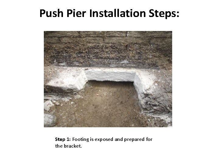 Push Pier Installation Steps: Step 1: Footing is exposed and prepared for the bracket.