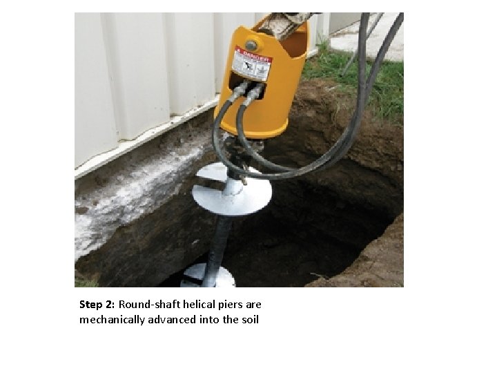 Step 2: Round-shaft helical piers are mechanically advanced into the soil 