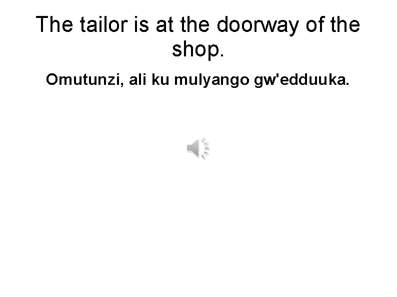 The tailor is at the doorway of the shop. Omutunzi, ali ku mulyango gw'edduuka.