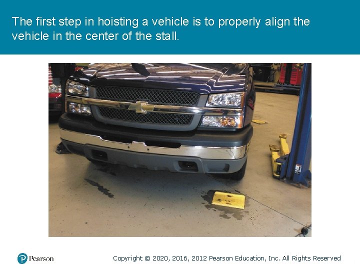 The first step in hoisting a vehicle is to properly align the vehicle in