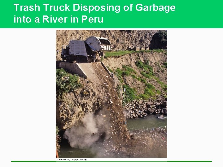 Trash Truck Disposing of Garbage into a River in Peru 