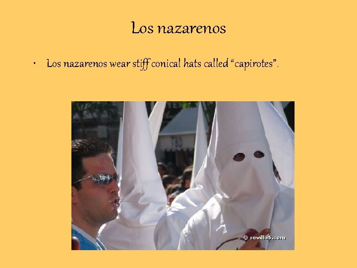 Los nazarenos • Los nazarenos wear stiff conical hats called “capirotes”. 