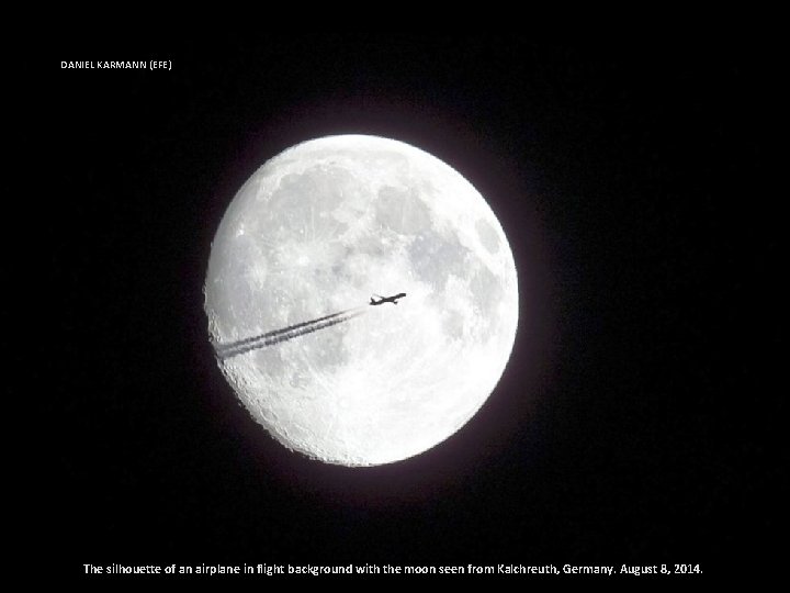 DANIEL KARMANN (EFE) The silhouette of an airplane in flight background with the moon