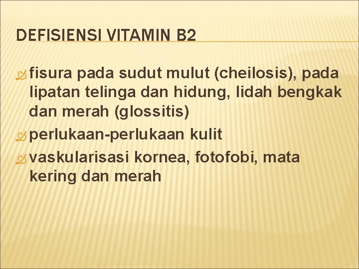 DEFISIENSI VITAMIN B 2 fisura pada sudut mulut (cheilosis), pada lipatan telinga dan hidung,