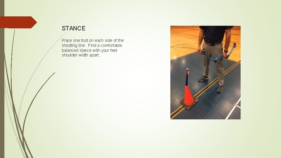 STANCE Place one foot on each side of the shooting line. Find a comfortable