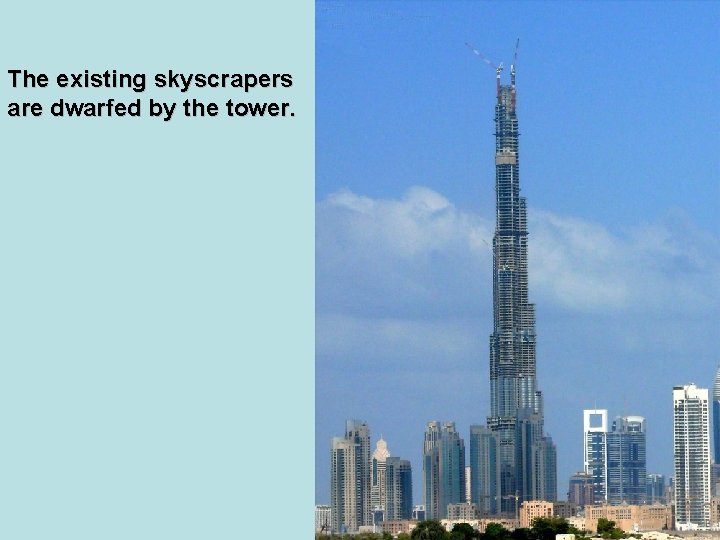 The existing skyscrapers are dwarfed by the tower. 