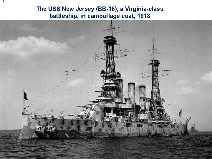 ) The USS New Jersey (BB-16), a Virginia-class battleship, in camouflage coat, 1918 