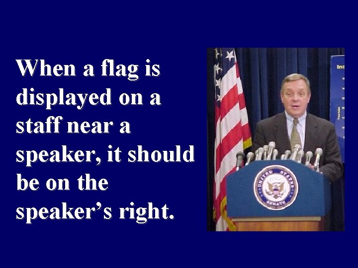 When a flag is displayed on a staff near a speaker, it should be