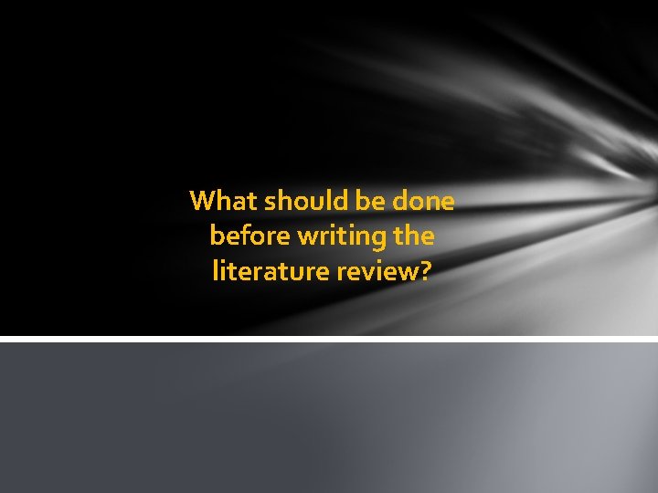 What should be done before writing the literature review? 